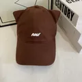 Detailed view of the dark brown baseball cap featuring 3D cat ears and new embroidery - M (56-58cm) / Coffee