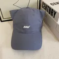 Detail of grey-blue baseball cap with cute 3D cat ears and white 'new' embroidery - M (56-58cm) / Haze Blue