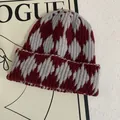 Detailed close-up of thick argyle knit texture and folded brim on this winter beanie - M (56-58cm) / Red (Wine Red)