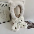 Detail of white plush hooded scarf with bear ears and flower embroidery on the quilted fabric - M / White