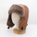 Detail of brown trapper hat with faux fur lining and chin strap on a mannequin head - M (56-58cm) / Brown