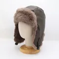 Detail of vintage brown faux leather aviator hat with plush faux fur lining and buckle - M (56-58cm) / Army Green