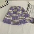 Close-up of violet and cream hand-knitted striped bucket hat on a vintage background - M(56-58cm) / Purple