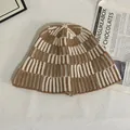 Detailed close-up of khaki and white checkerboard knit pattern on winter bucket hat - M(56-58cm) / Khaki