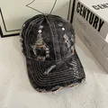 Detail of distressed grey denim baseball cap with frayed holes and contrast stitching - M (56-58cm) / Colorful