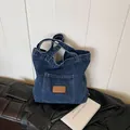 Bolso tote denim azul oscuro con costuras vintage y detalle de parche de cuero - Estilo 1 Azul Oscuro (Etiqueta de Cuero FIRSTXIU)