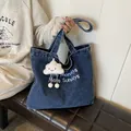 Dark blue denim tote bag with Less Mondays More Sundays embroidery and plush cloud charm - Style 2 Dark Blue And Cloud Pendant