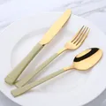 Couverts en acier inoxydable 304 dorés avec manches vert olive sur une assiette blanche - Ensemble Couteau Fourchette Cuillère / Or Vert