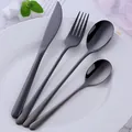 Set posate moderno da 4 pezzi in acciaio inossidabile nero con coltello, forchetta e cucchiai - Nero