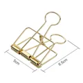 Clip raccoglitore in metallo dorato traforato per ufficio con dettaglio larghezza 5cm - Oro