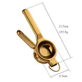 Spremiagrumi manuale in acciaio inossidabile dorato con manico lungo da 22,5 cm - Spremiagrumi Grande A350 Con Orecchio / Oro