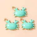 Three mint green crab pendants with gold plating and top loops for DIY jewelry making - Green