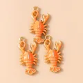 Drie oranje emaille kreeft hangers met goudlaag voor doe-het-zelf sieraden maken - Oranje