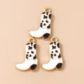 Detail of cow-print enamel cowboy boot charms with golden plated edges for DIY jewelry - White