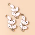Detail of leaf-shaped charms with pink enamel and evil eye motif for DIY jewelry - Silver Pink