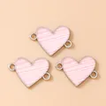 Dettaglio di ciondoli a cuore a righe rosa con doppi anelli per la creazione di gioielli - Confezione da 10 Pezzi / Rosa argento