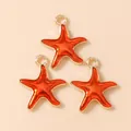 Starfish DIY jewelry pendants with orange enamel finish and gold metal frame set of 3 - Orange