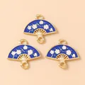 Detailed macro view of three blue enamel flower fan charms for jewelry making - Fan Dangle / Blue