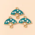 Detail showing blue enamel fan charms with white plum blossoms and gold metal frames - Fan Dangle / Dark Blue