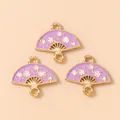 Macro detail of three lavender enamel fan pendants with plum blossom floral pattern - Fan Dangle / Purple