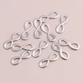 Silver infinity symbol charms for DIY jewelry making and fashion accessories 40 pieces pack - White K/Silver