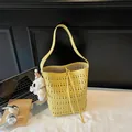 Yellow hollow-out bucket bag with plush puppy pendant and drawstring closure - 29*13*28 / Yellow Hollow Bucket Bag With Plush Pendant / Yellow With Pendant