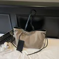 Khaki canvas tote bag with black handles and matching mini pouch for daily essentials - Dark Khaki