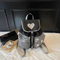 Cute black backpack featuring contrast heart patch and geometric patterned pockets - 30x16x31cm / Black