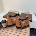 Borsa a tracolla trapuntata in camoscio marrone e pelle nera in due diverse misure - Grande / Marrone