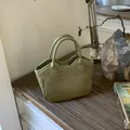Green woven bucket bag for women featuring intricate PU leather texture and retro style - Green Without Pendant