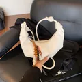 Chic cream dumpling bag in pleated faux leather with knotted handle and colorful beads - White