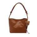 Brown faux leather tote bag with silver bow accent and plush bear charm detail - Brown