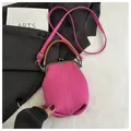 Detail of rose pink canvas frame handbag with silver hardware and leather handle - Rose Red