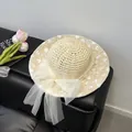Elegant beige straw hat with white floral lace embroidery and a large tulle bow detail - Bow Lace Straw Hat / Beige