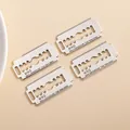 Silver alloy razor blade pendants with vintage MNG 20th anniversary engraved details - Antique Silver
