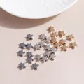 Mix of gold and silver star pendants for DIY jewelry making on a minimalist background - Multicolor