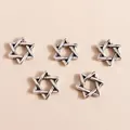 Close-up of vintage silver plated alloy hexagram charms for DIY jewelry making - Antique Silver