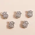Five vintage silver owl charms for DIY jewelry making featuring intricate feather details - Antique Silver