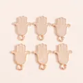 Detail of six gold-plated Hamsa Hand pendants for DIY jewelry making in a 2x3 layout - Gold