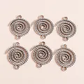 Detail of vintage spiral alloy charms in antique silver finish for DIY jewelry making - Antique Silver