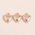 Close-up of golden heart pendants with Love engraving and beaded edges for DIY jewelry - Love Lettering Heart / Set of 3 / Gold