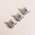 Detailed view of three vintage silver alloy hollow evil eye pendants for DIY jewelry - Antique Silver