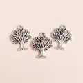 Detailed view of vintage silver Tree of Life charms with embossed leaves for DIY jewelry - Antique Silver