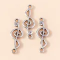 Set of three vintage silver treble clef music note charms for DIY jewelry making - Silver