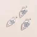 Detailed view of silver leaf alloy pendants with vintage texture for DIY jewelry making - Silver