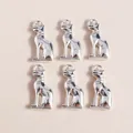 Macro shot of silver plated Egyptian Bastet cat pendants for DIY jewelry making accessories - Silver