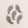 Five vintage alloy paisley feather pendants in antique silver finish for DIY jewelry crafts - Antique Silver
