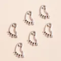 Set of 6 silver electroplated alloy hollow footprint charms for DIY jewelry making - Silver