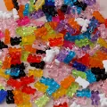 Detailed view of colorful resin gummy bear charms with metal eyelet pins for DIY jewelry - Multicolor