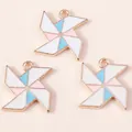 Three colorful windmill charms in gold alloy and enamel for DIY jewelry making - White